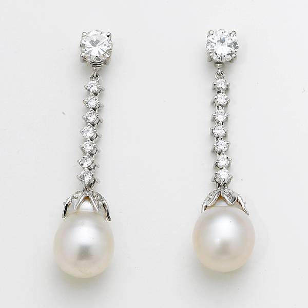 Appraisal: A pair of diamond stud earrings with cultured pearl and