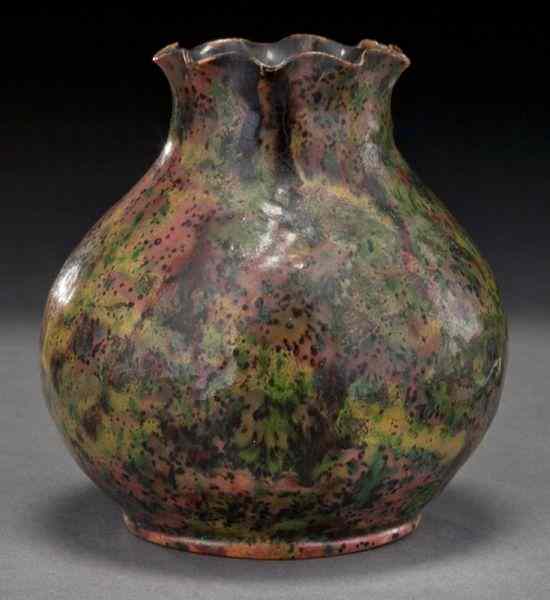 Appraisal: George Ohr glazed ceramic vase with a ruffled rim having