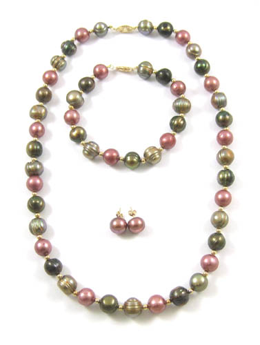 Appraisal: THREE PIECE MULTI-COLOR PEARL SET consisting of princess length necklace