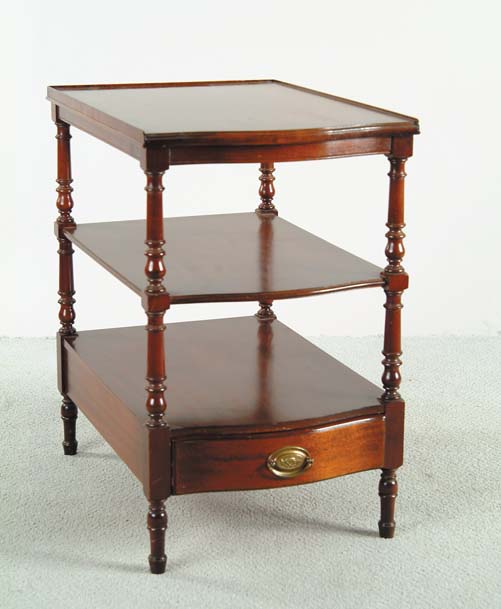 Appraisal: ONE DRAWER THREE TIER MAHOGANY STAND Serpentine front turned legs