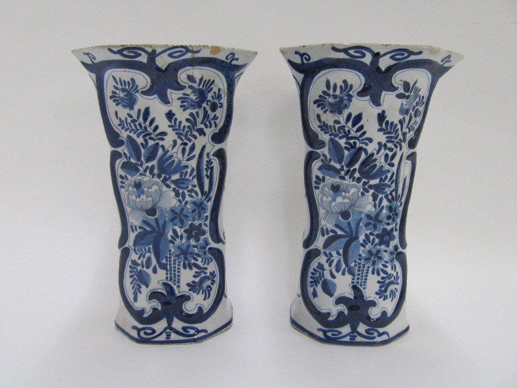 Appraisal: Pair of Delft blue and white vases painted with flowers