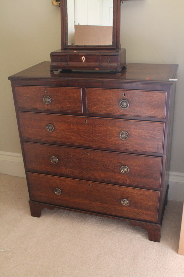 Appraisal: A thC oak chest of two short and three long