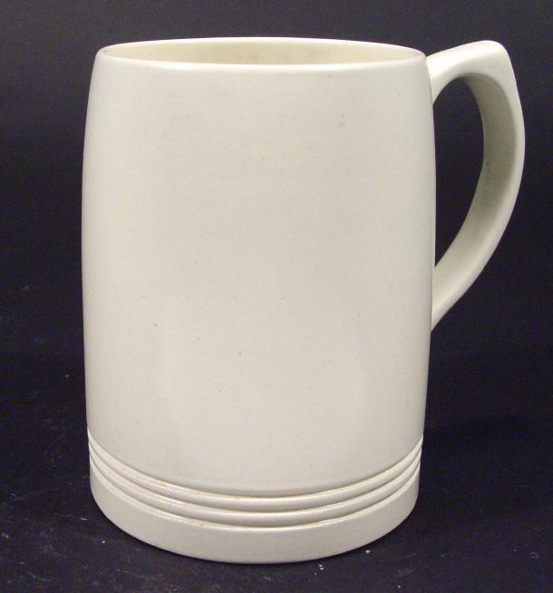 Appraisal: White glazed Keith Murray Wedgwood tankard printed factory marks and