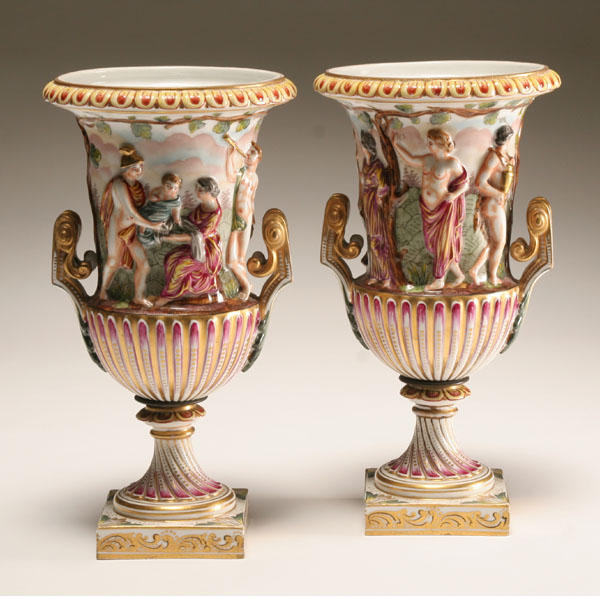 Appraisal: Pair Capo di Monte classical urns raised figures depict life