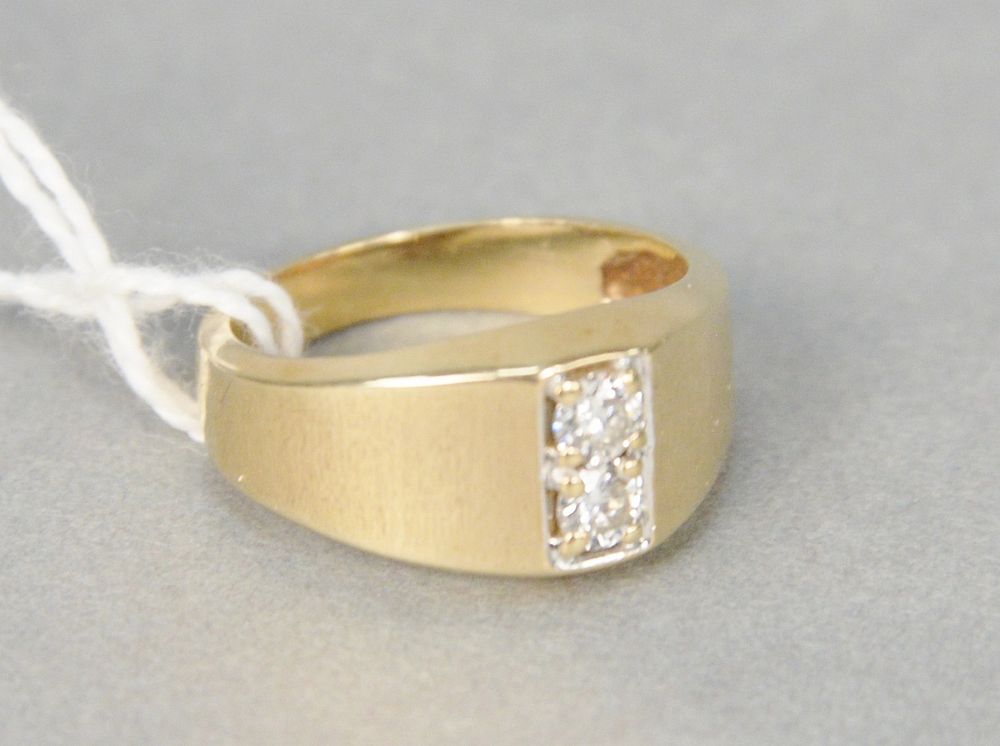 Appraisal: karat yellow gold ring set with two small diamonds approximately