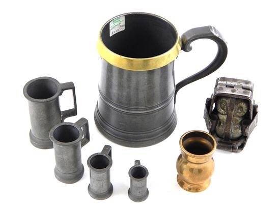 Appraisal: Late th th C metal measures tankard and food mold