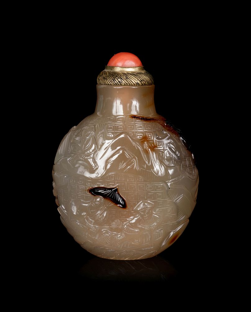 Appraisal: A Well Carved Shadow Agate Snuff Bottle Height overall in