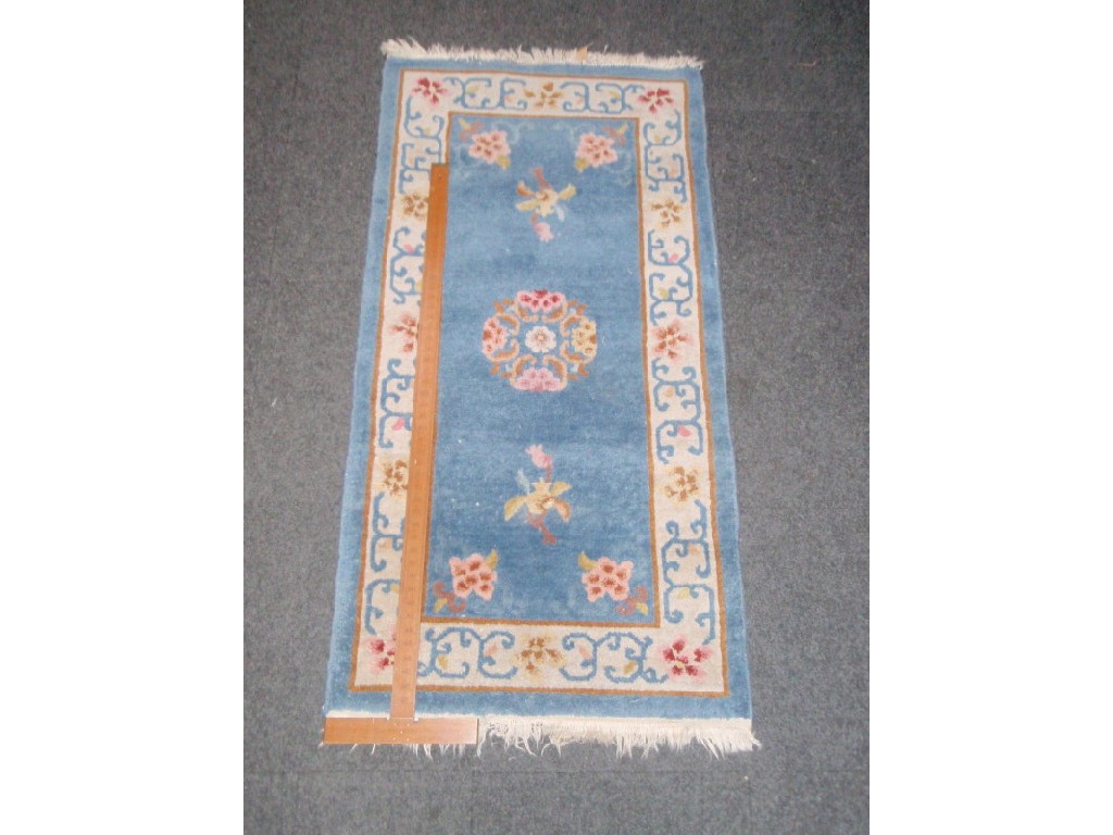 Appraisal: A blue ground Chinese rug cm x cm