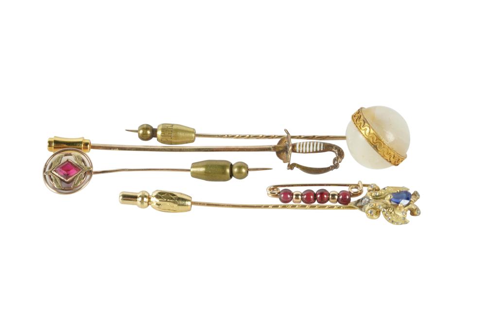 Appraisal: FIVE GOLD GEM-SET STICK PINScomprising one karat yellow gold double-eagle