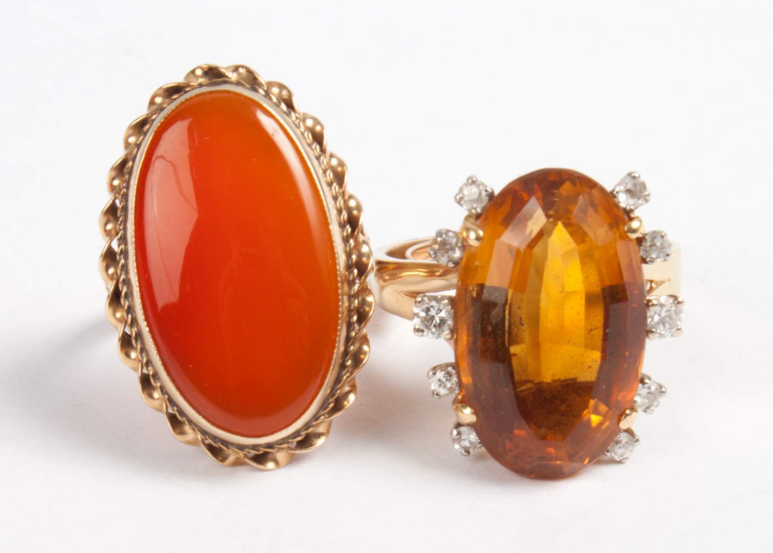 Appraisal: Two lady's gold and colored stone rings comprising a gold