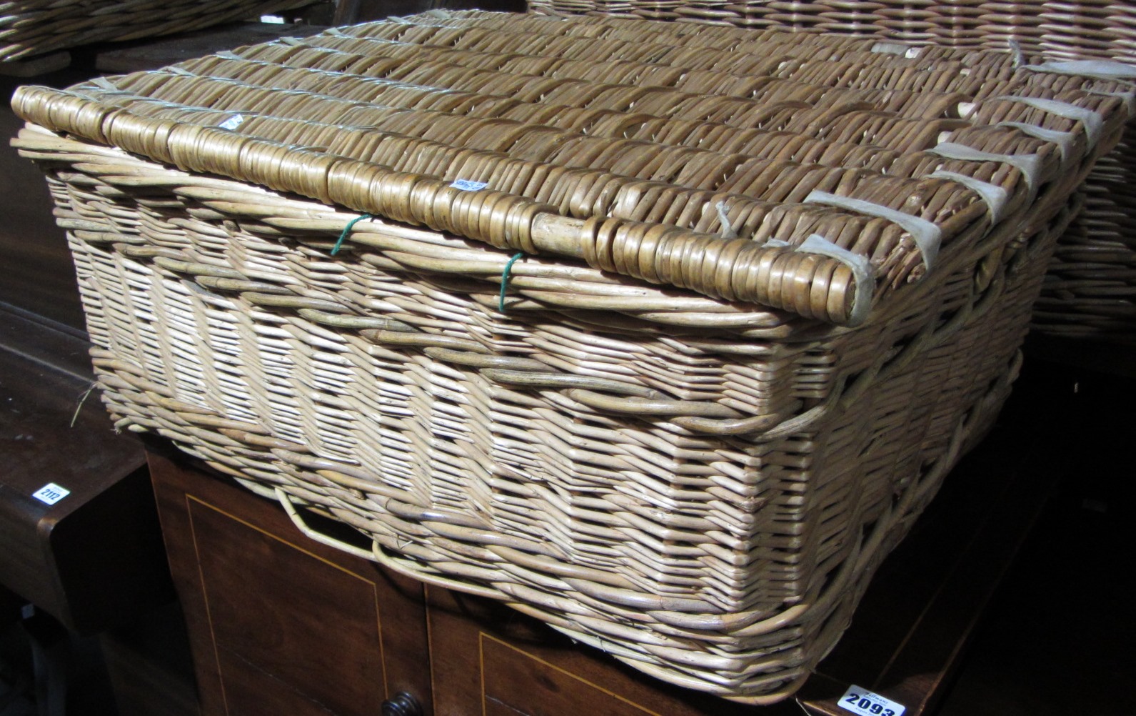 Appraisal: A similar pair of large wicker trunks