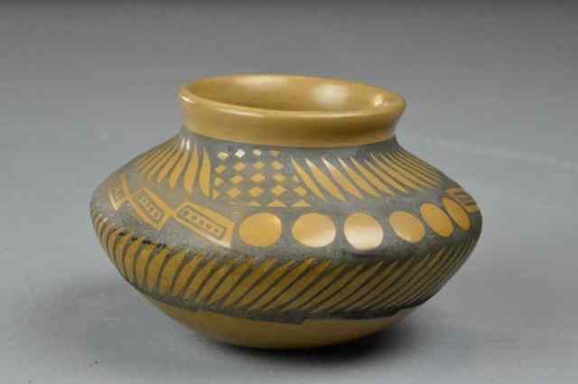 Appraisal: NATIVE AMERICAN OLLA POT SIGNEDNavajo style sand colored th C