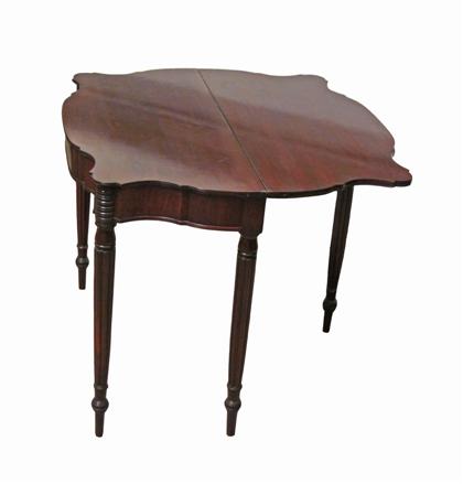 Appraisal: Federal mahogany games tableThe shaped top with molded edge above