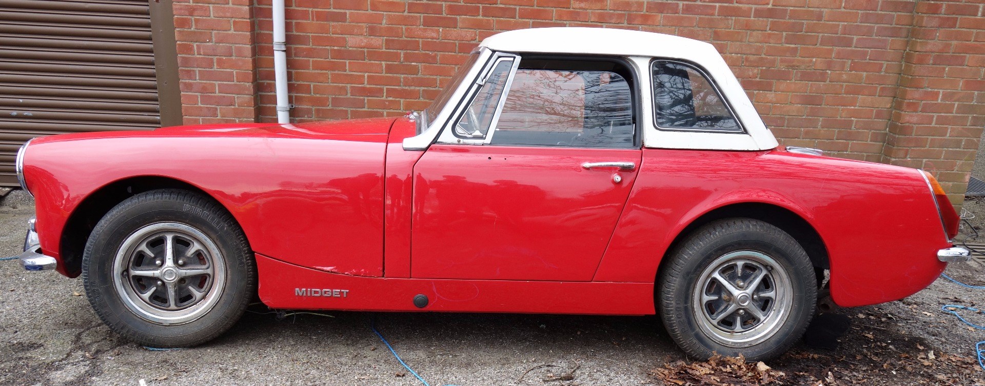 Appraisal: A MG Midget red cc Registration OHY M