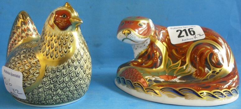 Appraisal: Royal Crown Derby Paperweights Farmyard Hen and Otter boxed with