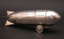 Appraisal: Airship Martini Shaker Polished aluminum martini shaker in the shape