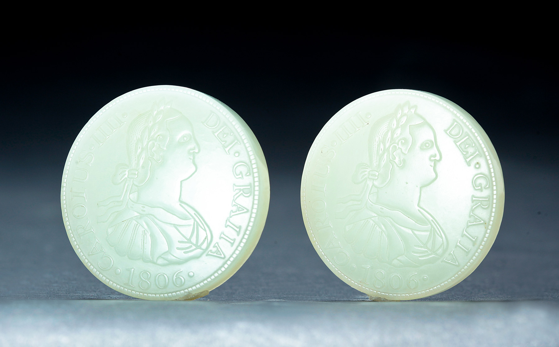 Appraisal: RARE PAIR OF CHINESE WHITE JADE COINS Qing Dynasty th