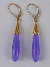 Appraisal: A pair of purple stone earrings with yellow metal tests