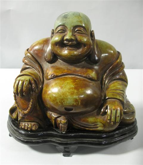 Appraisal: CHINESE HARDSTONE FIGURE OF A SEATED BUDDHA The material of