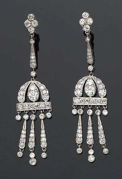 Appraisal: A pair of art deco diamond and platinum earrings each