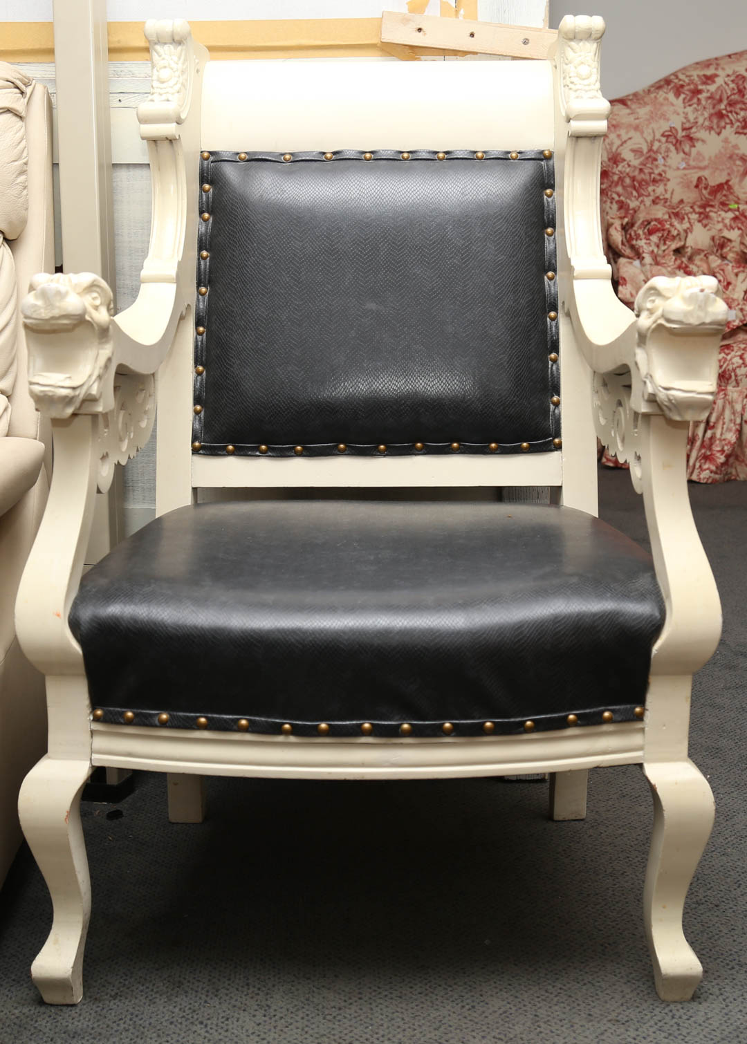 Appraisal: Painted upholstered hall chair with lion heads