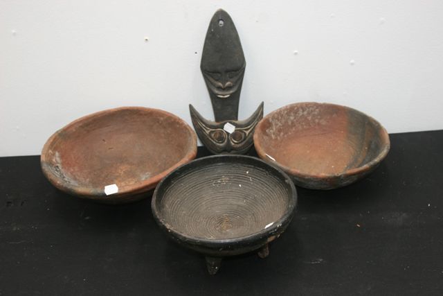 Appraisal: A group comprising three terracotta bowls and a basket hook