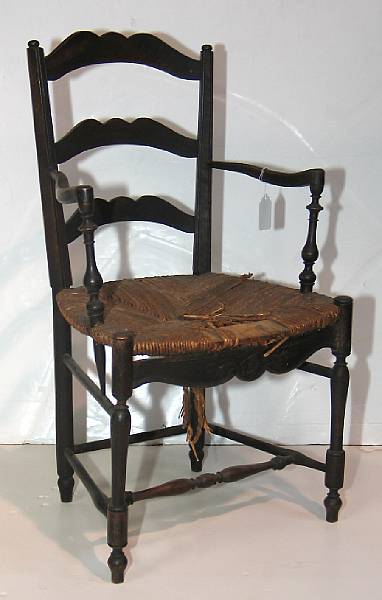 Appraisal: An English provincial rush seat armchair late th century height