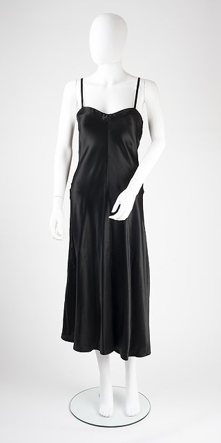 Appraisal: A black Biba ribbon slip dress with zip fastening and