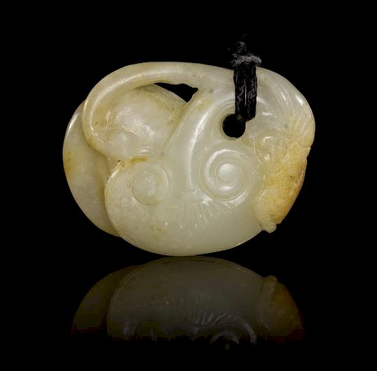 Appraisal: A Carved Jade Pendant Length inches A Carved Jade Pendant