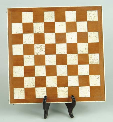 Appraisal: EXTREMELY RARE WHALEBONE AND MAHOGANY CHECKERBOARD This wonderful seaman's creation