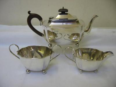 Appraisal: A THREE PIECE TEA SET of oblong form with incurved