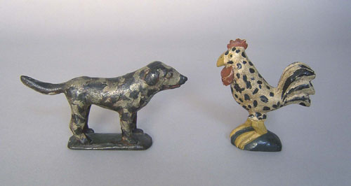 Appraisal: Carved and painted dog and rooster in the manner of