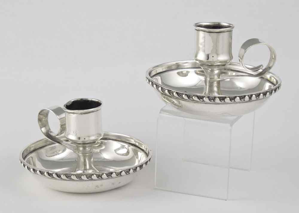 Appraisal: PAIR MAUSER STERLING CANDLE STANDS Pair single light sterling candle