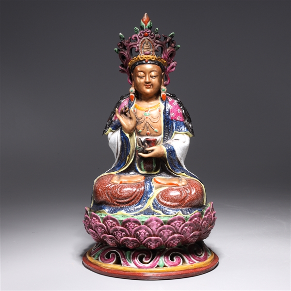 Appraisal: Chinese enameled porcelain deity with large areas of gilt detail