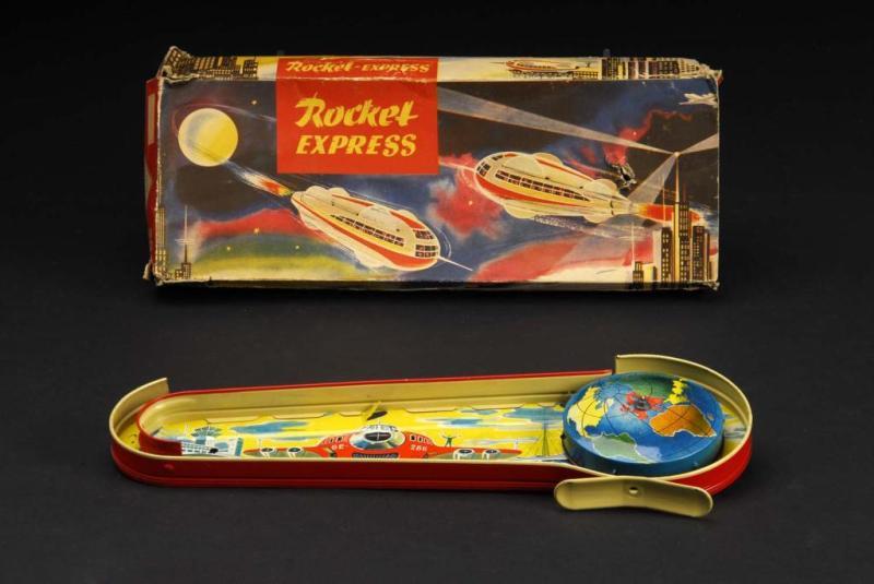 Appraisal: Tin Technofix Space Rocket Express Wind-Up Toy Description German Working