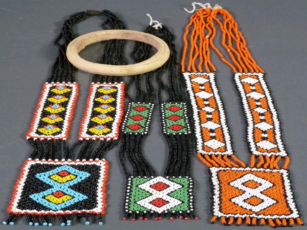 Appraisal: THREE PROBABLY MID TH CENTURY AFRICAN BEADWORK NECKLACE each with