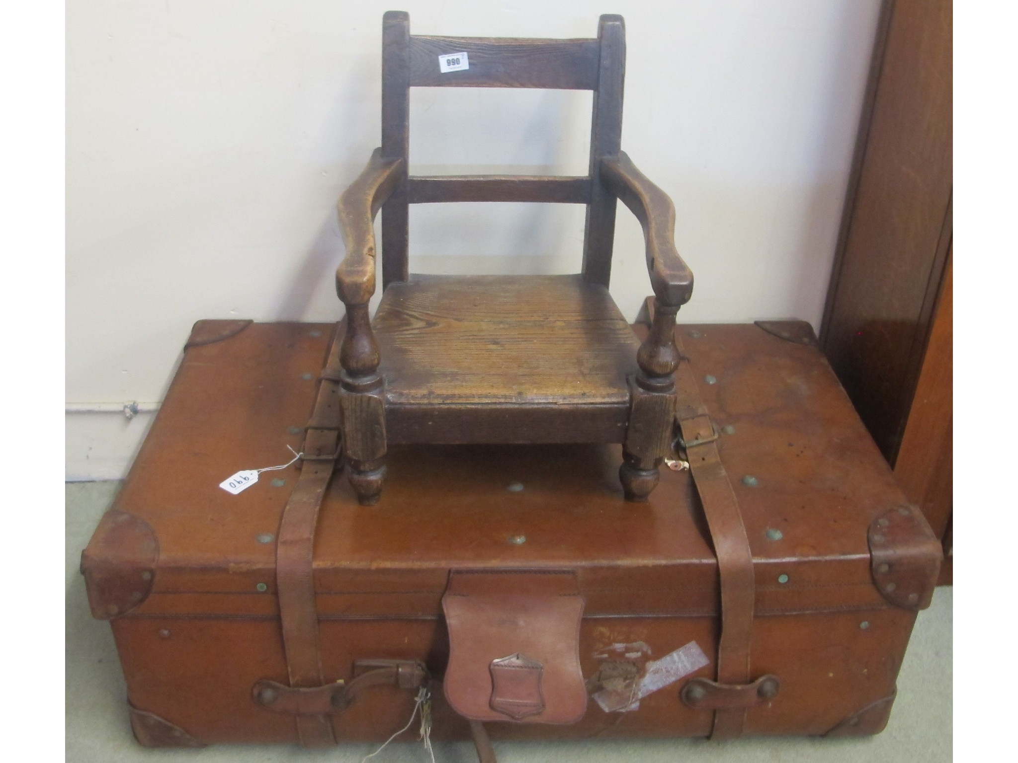 Appraisal: A leather bound vintage travel trunk and a Scottish child's