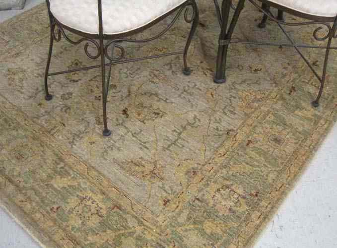 Appraisal: HAND KNOTTED ORIENTAL CARPET West Anatolian Oushak design of stylized