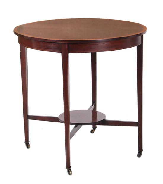 Appraisal: Edwardian inlaid mahogany table circa round crossbanded top tapered legs