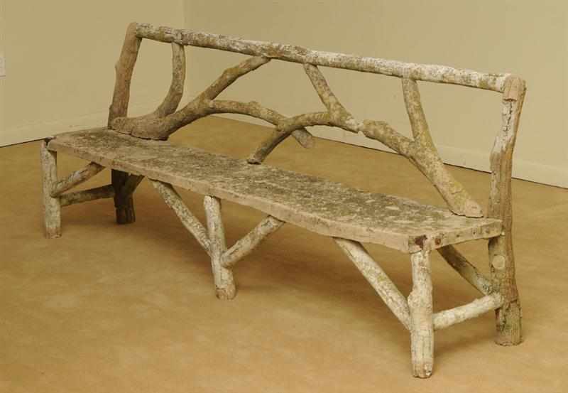 Appraisal: CAST-STONE RUSTICATED TWIG FORM BENCH The rectangular twig-formed back rest