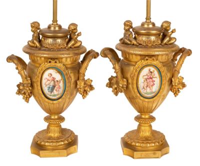 Appraisal: A pair of gilt metal table lamps of urn form