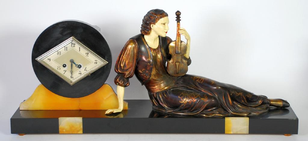 Appraisal: LARGE FRENCH ART DECO GILT METAL AND BLACK SLATE FIGURAL