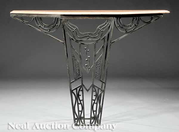 Appraisal: An Art Deco-Style Wrought Iron Console marble top chased and