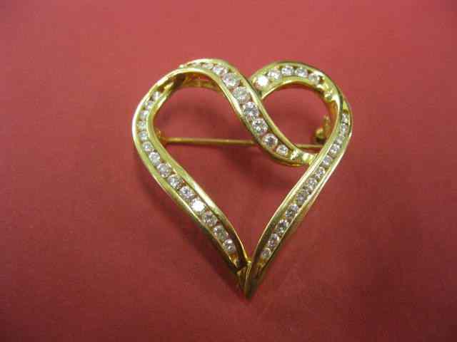 Appraisal: Diamond Heart Brooch diamonds totaling carat high grade k yellow