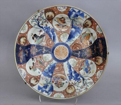 Appraisal: JAPANESE IMARI PORCELAIN DISH The pinwheel rondel with radiating figure