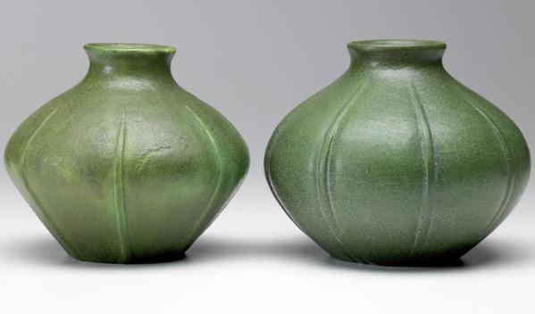 Appraisal: GRUEBY Two closed-in vases with incised leaves under matte green