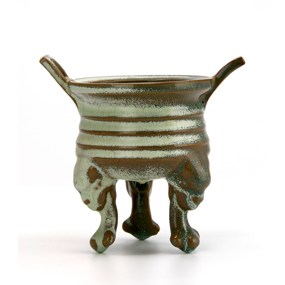 Appraisal: Chinese Jun Type Tripod Censer A ribbed cylindrical celadon tripod