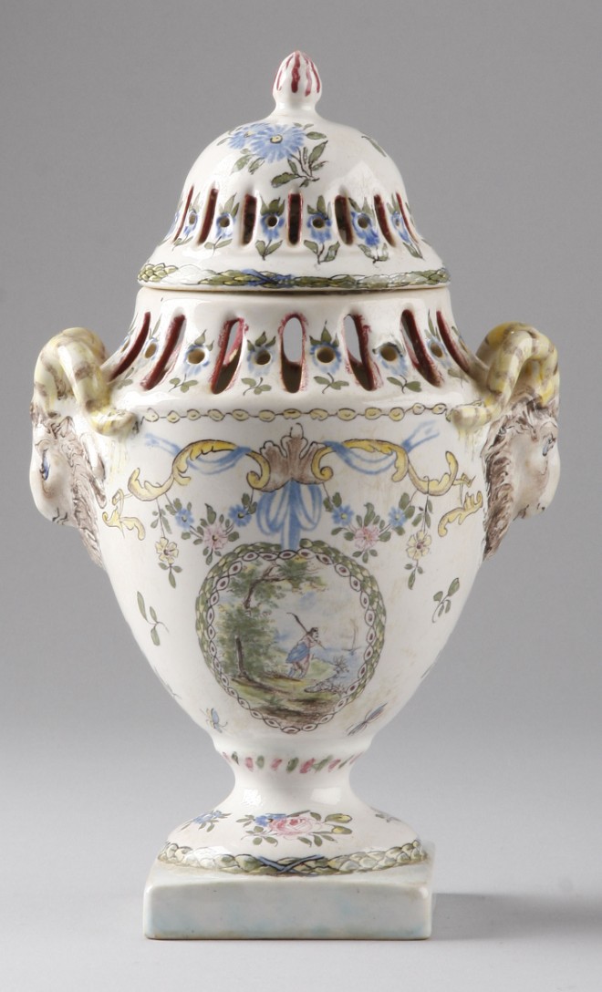 Appraisal: Lidded urn with rams head form handles t floral motif