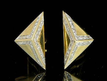 Appraisal: A Pair of Diamond Omega Earrings Good solid construction in