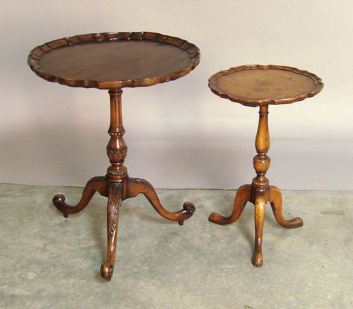 Appraisal: Two Chippendale style wine stands h w and h w